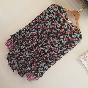 Bell sleeve romper in floral print